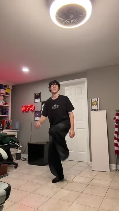 Gaige recreating a Fortnite dance in his room